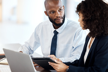 Image showing Executive planning, black man and meeting with team, technology and strategy review in office. Financial advisor, investment management and corporate leader listen to feedback of business accounting