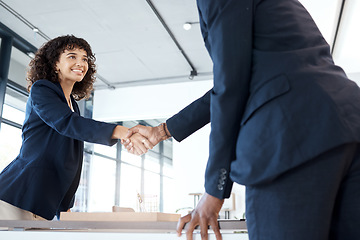 Image showing Business people, handshake and smile for b2b, meeting or partnership in teamwork at the office. Happy female executive shaking hands with employee for interview, greeting or introduction at workplace