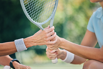 Image showing Hands together, tennis racket and coach with woman athlete, support and helping hand at training. Women, coaching and learning for sports, goals and motivation by blurred background outdoor for goal