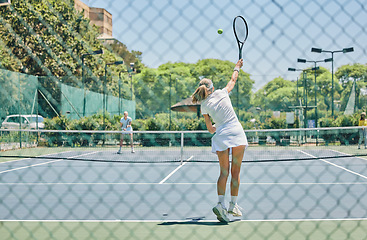 Image showing Tennis, sports and woman on outdoor court, fitness motivation and competition with athlete training for game. Workout, healthy and player on court, active with sport and exercise with action on turf