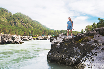 Image showing Woman resting at river