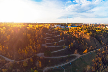 Image showing Aerial top vew of winding road in the city