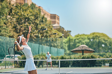 Image showing Tennis court, woman and serving for sports competition outdoor for fitness, exercise and training. Healthy people at club for game, workout and performance for health and wellness with summer cardio