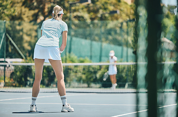Image showing Woman, tennis court and sports game outdoor for fitness, exercise and training for competition. Healthy people at club for match, workout and performance for wellness mockup with summer cardio