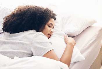 Image showing Sleeping, comfortable and black woman in bed for rest, relax and stress relief. Night, nap and African girl lying in a bedroom while tired with fatigue, pillow and blanket while dreaming and resting