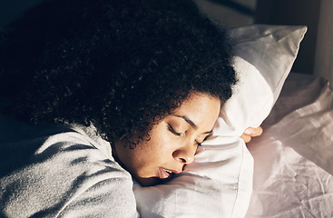 Image showing Sleep, black woman and bed in morning for peace, quiet and rest or relax in home bedroom. Person face on pillow to dream or for calm sleeping with insomnia or fatigue therapy for health and wellness