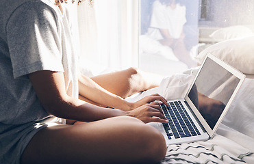 Image showing Hands, laptop and typing in bed in bedroom for social, media or internet browsing in the morning. Digital technology, remote worker and woman working on project, writing email or research on computer