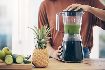 Image showing Blender, green smoothie and woman hands for diet, detox and healthy morning breakfast in kitchen with fruit. Vegetables, food and young person or nutritionist with nutrition drink for vegan protein