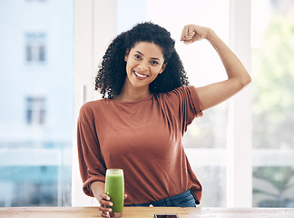 Image showing Portrait, muscle and smoothie with a black woman in the kitchen of a home flexing her bicep for health. Wellness, weight loss and strong with an attractive young female drinking a diet beverage