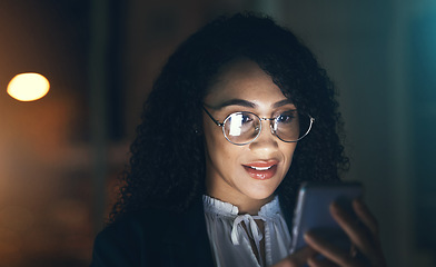 Image showing Black woman, business phone and face at night for communication with network connection. Entrepreneur person in dark office for social media, networking or mobile app reading online review or email