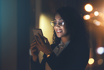 Image showing Night, business and woman with smartphone, typing and smile for achievement, new project and social media. Late, female and girl with cellphone, connection and overtime with device and online reading