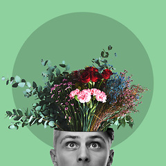 Image showing Mental health, flowers and head with a man in studio on a green background for freedom of expression. Abstract, nature and brain growth with a male posing for art, idea or creative thinking