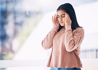 Image showing Headache, burnout or mockup with an indian woman on a blurred background suffering from pain or stress. Compliance, mental health or anxiety and a frustrated young female struggling with a migraine