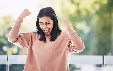 Image showing Winning, winner or Indian woman with yes, wow and success fist pump for excited news, bonus or sale. Celebration, freedom and dance, happy young person dancing for opportunity, achievement or results