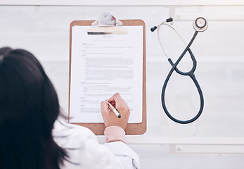 Image showing Top view, hands or doctor writing on clipboard hospital prescription, medical research or signing consulting form. Woman, stethoscope or healthcare paper documents for wellness life insurance or help