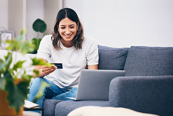 Image showing Ecommerce, laptop or woman with credit card happy with digital payment while relaxing on sofa at home. Smile, finance or girl excited with online shopping subscription discount, sales offer or deal