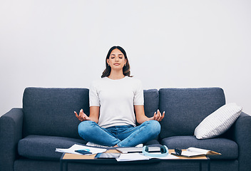 Image showing Studying, meditation and Indian woman in a living room with zen to relax from book learning. Sofa, home and female student meditate on a couch doing yoga for wellness in a house with education book