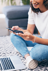 Image showing Credit card, online shopping and woman with fintech, banking and easy payment on home carpet. Young person or student with phone and laptop for e commerce sale, finance and wealth in her living room