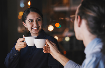 Image showing Business people, night and office with coffee cup together for toast, motivation and energy for project. Businessman, woman and drink for celebration, team building and success in dark workplace