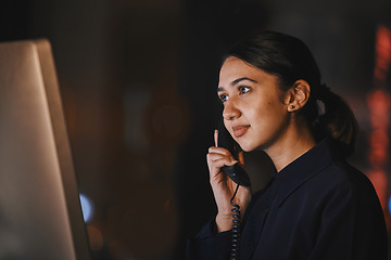 Image showing Office, night and business woman on a phone call for communication, networking and customer support. Receptionist, secretary and female on telephone for online feedback, telemarketing and connection