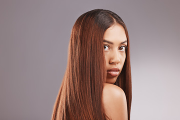 Image showing Black woman, hair care and studio portrait for healthy shine, beauty and wellness by gray background. Young gen z model, girl and cosmetics for growth, keratin health and aesthetic with confidence