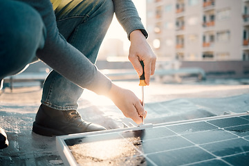 Image showing Solar panel, screwdriver and worker hands with tools for renewable energy and electricity. Sustainable innovation, roof work and engineering employ install eco friendly and sustainability product