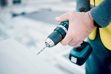 Image showing Construction, building and hands with a driller for architecture, maintenance and handyman work. Builder, contractor and man with an electric power tool for hardware, repairs and industrial job