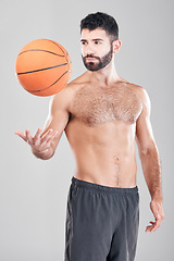 Image showing Fitness, sport and man throwing basketball in air, topless sports player isolated on grey background. Exercise, motivation and training, male model with workout mindset and strong muscle in studio.