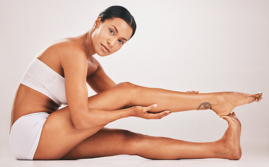 Image showing Body, legs and portrait of black woman for health and wellness in studio for skincare epilation and self care. Underwear model person on grey background for healthy diet, hair removal and spa results