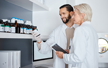Image showing Science, medicine and people in laboratory with tablet for vaccine results, medical report and research. Pharmaceutical, health and scientists team reading label for data analysis, lab test and study