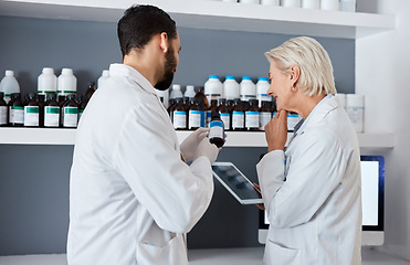 Image showing Science, medicine and team with tablet in laboratory for vaccine, medical report and research. Pharmacy, healthcare and scientists reading label of medication for data analysis, results and study