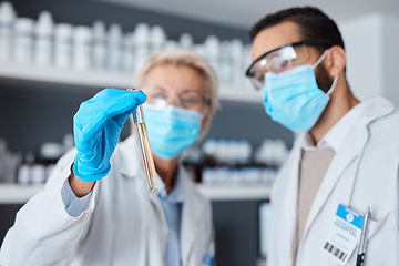 Image showing Medical science, test tube and team in laboratory with face mask or ppe for research or analysis. Man and woman scientist or doctor hand for futuristic chemical or medicine innovation or development