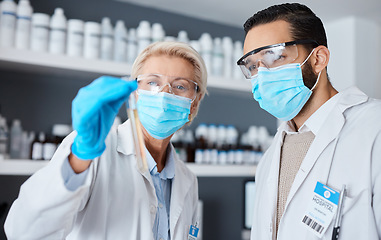 Image showing Doctors, medical science and laboratory with face mask or ppe for medicine research, test or analysis. Man and woman scientist collaboration for futuristic chemical cure, innovation and development