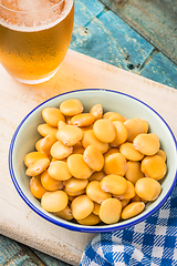 Image showing Tasty lupins and glass of beer