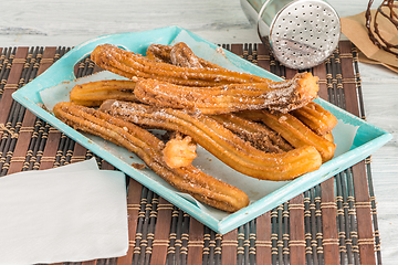 Image showing Traditional churros with hot chocolate 