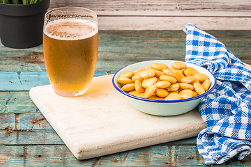 Image showing Tasty lupins and glass of beer