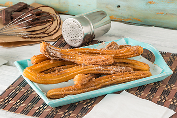 Image showing Traditional churros with hot chocolate 