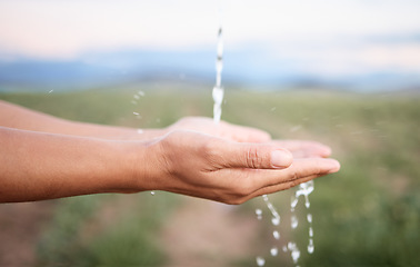 Image showing Hands, water and washing or cleaning for hygiene, hydration and sustainability with a splash outdoors on a farm. Person, ecology and aqua to prevent germs or bacteria for care, wellness and health