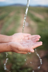 Image showing Hands, splash and washing or cleaning with water, hydration and freshness for sustainability outdoors on a farm. Person, ecology and aqua to prevent germs or bacteria for care, wellness and health