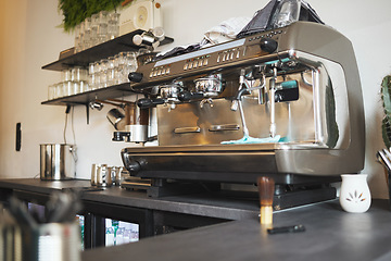 Image showing Closeup cafe, coffee and machine equipment in small business, beverage shop or retail. Backgrounds of barista services, drinks machinery and restaurant store of premium espresso, cappuccino and latte