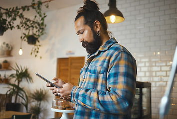 Image showing Social media, search or cafe man with tablet for networking or company blog content review. Focus, manager or coffee shop hipster employee on tech typing for planning, research or internet mobile app