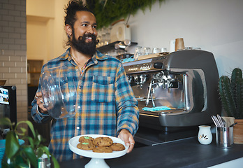 Image showing Barista man, coffee shop and plate for cookies at small business with service, care and experience. Young entrepreneur, cafe and kindness with food, snack or dessert for energy, health and wellness