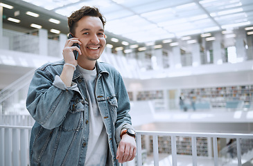 Image showing Man, phone call and portrait for a happy conversation in a library building with positive mindset. Young gen z person or college student with smartphone for communication, talking and happiness