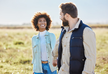 Image showing Love, relax and holding hands with interracial couple on farm for agriculture, peace and growth. Trust, nature and hug with man and black woman in grass field for sustainability, agro and environment