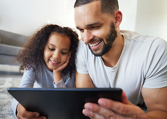 Image showing Child, father or bonding on tablet in house, home or floor for live streaming, watching movies or education social media. Smile, happy kid or man on technology for video call, children website or app