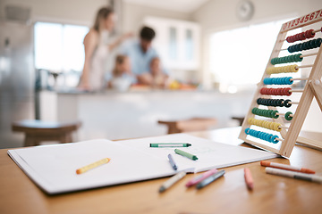 Image showing Crayon, book and paper with education toys on table for child development, learning and knowledge. Family home, children and notebook for drawing, writing and color activity for kids in living room