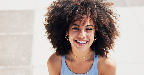 Image showing Portrait, black woman and smile in city, sunshine and girl on break, town and casual with happiness. Afro, African American female and face outside, happy and weekend to relax, carefree and freedom