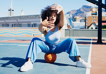 Image showing Basketball court, fashion and frame of hands of black woman urban style, feminist and armpit hair in city. Sports, fitness and portrait of girl with ball in stylish, confident and trendy clothes