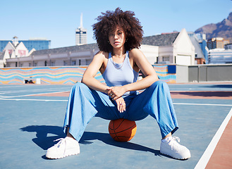 Image showing Fashion, city and portrait of black woman with basketball court with trendy, urban style and edgy clothes. Sports, fitness park and girl pose outdoors with ball with confidence and attitude