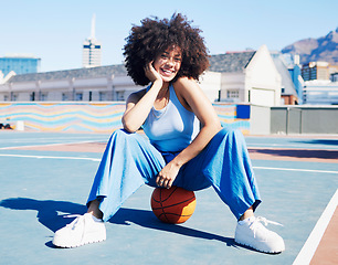 Image showing Basketball court, fashion and portrait of black woman with smile in trendy, urban style and edgy clothes in city. Sports, fitness park and girl outdoors with ball for motivation, happy and confident